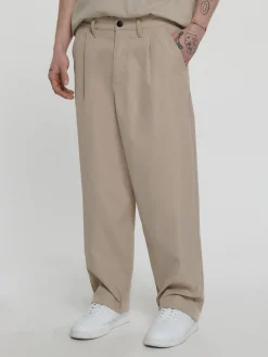 Clearance Cropp Beżowe spodnie loose ADU.LTD beżowy