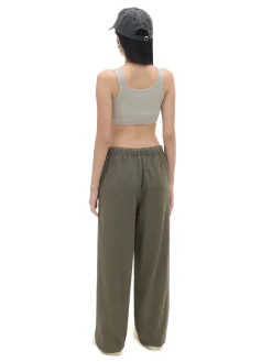 Sale Cropp Ciemnozielone jeansy parachute zielony
