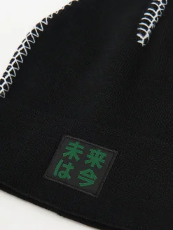 Outlet Cropp Czarna dzianinowa czapka z obszyciem czarny