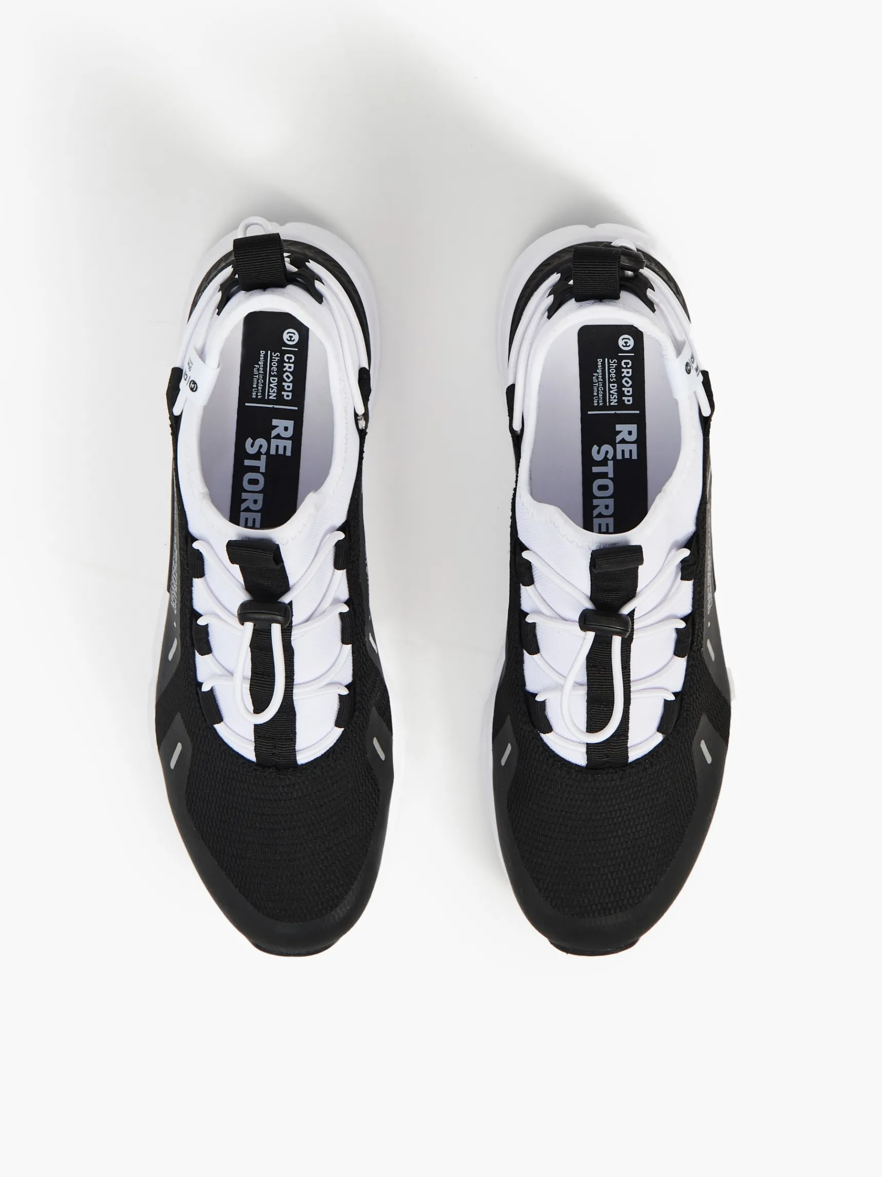 Best Cropp Czarno-białe sneakersy z odblaskowymi detalami biały