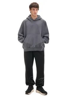 Outlet Cropp Dresowe joggery z odblaskowym printem czarny