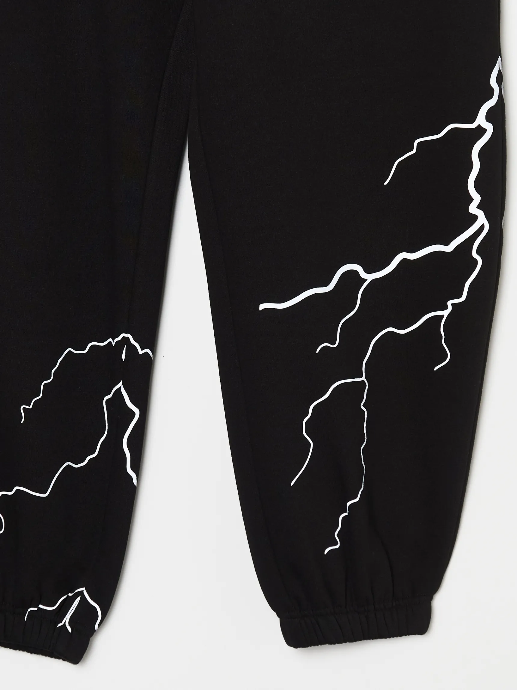 Outlet Cropp Dresowe joggery z odblaskowym printem czarny