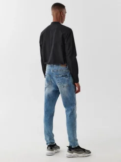 Online Cropp Jasne jeansy carrot niebieski
