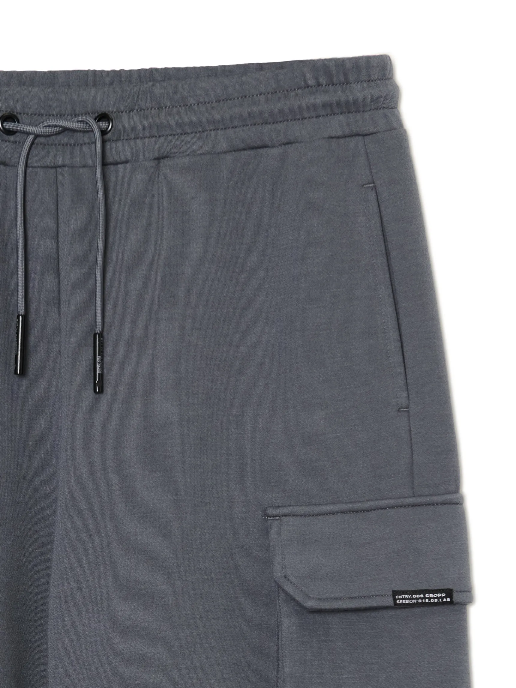 New Cropp Solidne dresowe joggery regular z kieszeniami szary