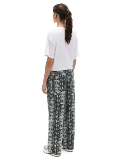 Clearance Cropp Spodnie baggy z wężowym motywem szary
